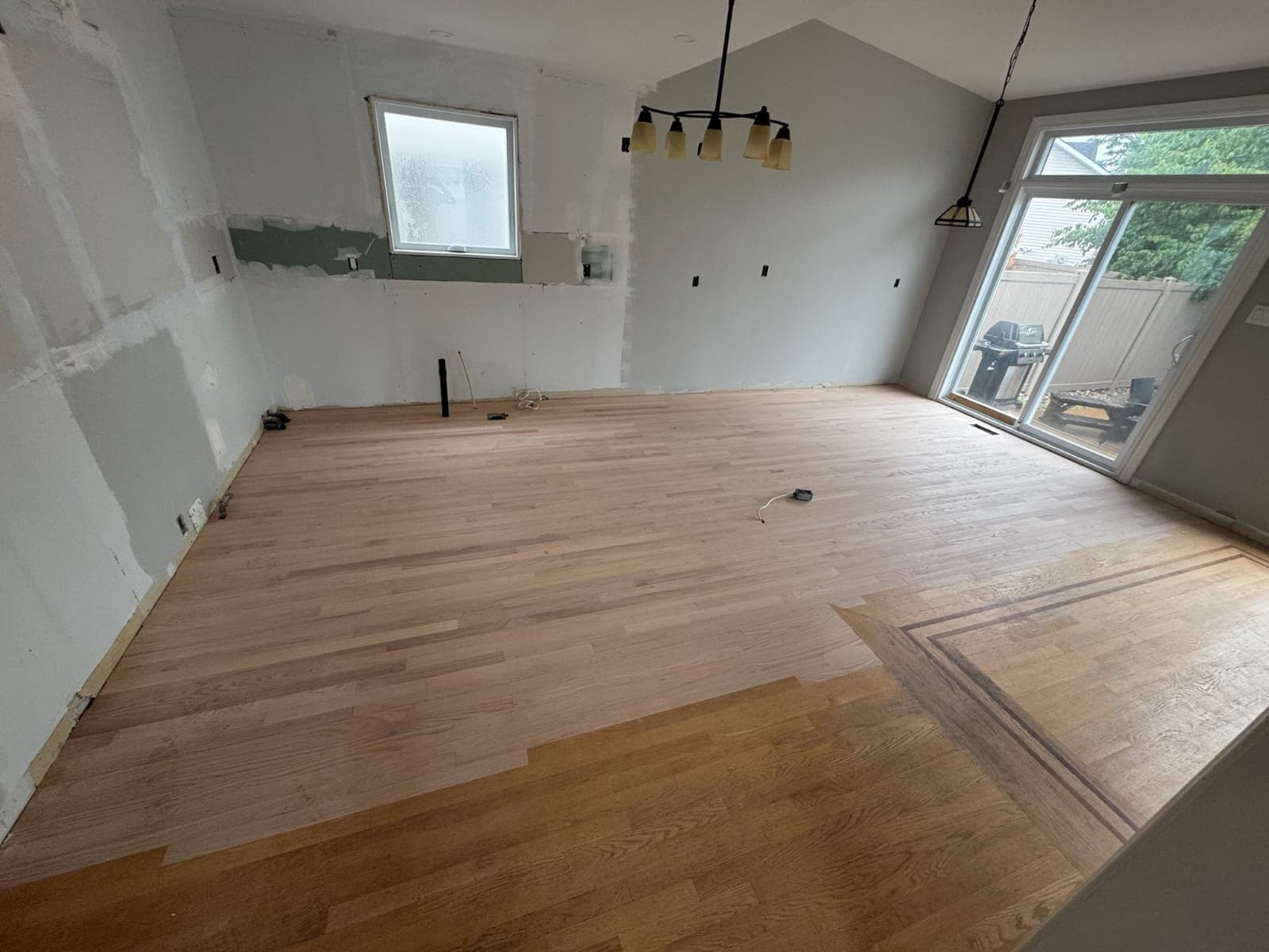 Wood flooring installation in progress