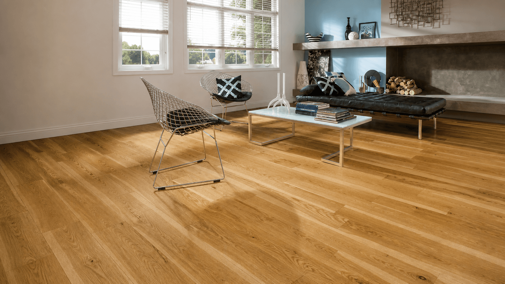 Warm natural hardwood flooring in a finished living room